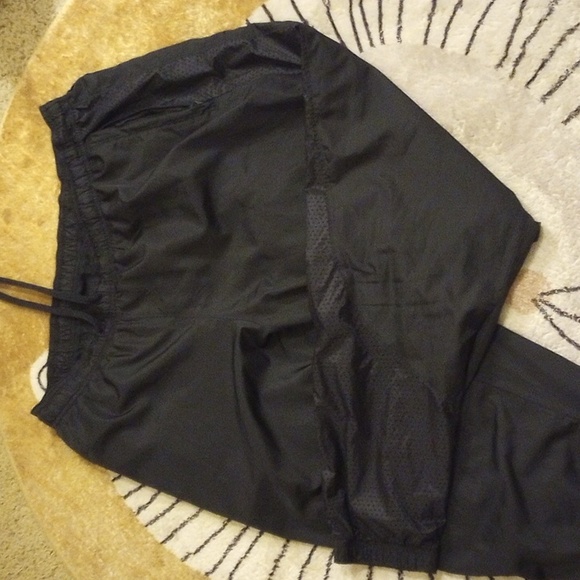 UA Men's Unstoppable Wind pants - Picture 2 of 7